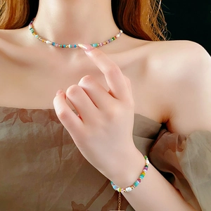 Baroque pearl jewelry set with 18K gold-plated beads on necklace and bracelet set