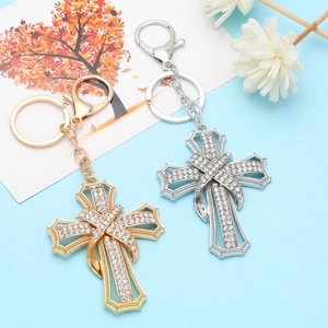 Sparkling cross keychains in gold and silver finish with rhinestones for bags and keys