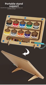 Macro view of wooden magnetic color and number maze toy with sorting beads and stylus