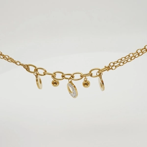 18K gold plated stainless steel bracelet with oval chain links and crystal charms