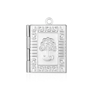 Macro detail of silver book-shaped locket pendant with tree relief and greek key pattern