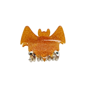 Sparkly orange bat hair claw clip with glitter finish and silver metal teeth for Halloween