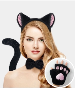 Detail of black cat cosplay set including plush ears and paws with pink sequins