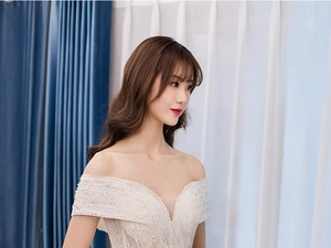 Exquisite detail of bridal gown with shimmering sequins and delicate beadwork embroidery