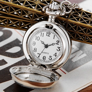 Detail shot of vintage silver pocket watch with open case, quartz dial and metal chain