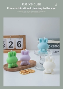 Cute bunny scented candles in four pastel colors with bow tie detail for home decor
