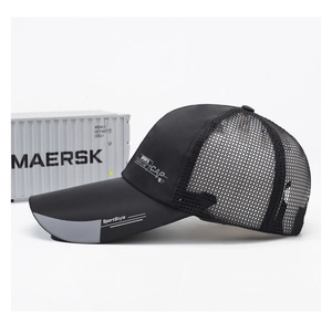 Close-up of black breathable mesh and long visor detail on a men's sports baseball cap