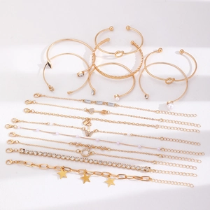 Vergulde armbandenset met hart-sleutelhanger, sterren en geknoopte armbanden