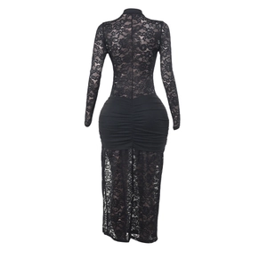 Detailed view of the sheer floral lace texture and ruched back design on a black midi dress