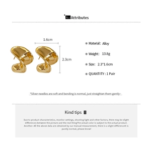 Detailed size specifications for gold twisted C-shape earrings with silver needles