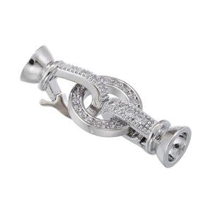 Close-up of silver-plated heart pearl clasp with sparkling cubic zirconia inlay