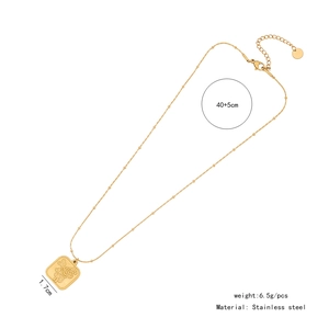 Detail view of a gold tarot-style rose pendant with dimension and weight specifications