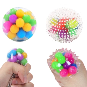 Stress relief squeeze balls with colorful interior beads in smooth and spiked styles