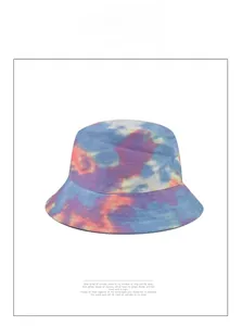 Detailed close-up of colorful tie-dye bucket hat with blue and purple cotton texture