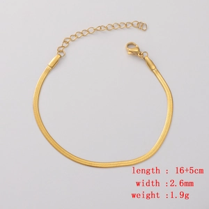 Detail of 2.6mm gold flat snake chain bracelet with lobster clasp and sizing specs
