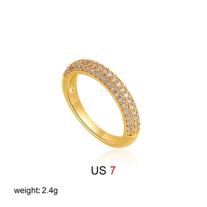 Detail of 18k gold plated pavé ring size US 7 featuring triple rows of sparkling zircons