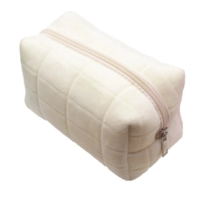 Minimalist cream-white plush pencil case with textured square quilted pattern and zipper