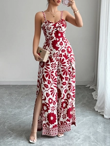 Detail of red floral wide-leg jumpsuit with spaghetti straps and side leg slits
