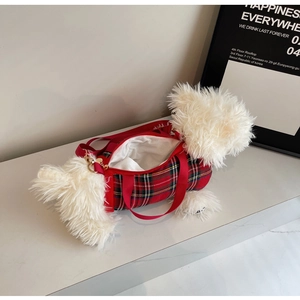 Detail of red plaid plush bag showing white interior lining and high-quality gold zipper