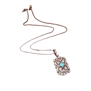 Elegant adjustable silver chain necklace with a vintage turquoise floral rhinestone pendant
