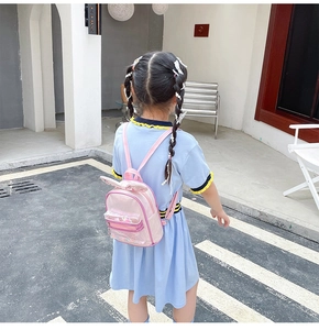 Pink toddler backpack with sequin rabbit ears and transparent front pocket details