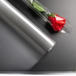 Close-up of thickened transparent OPP floral film showing high clarity on red roses