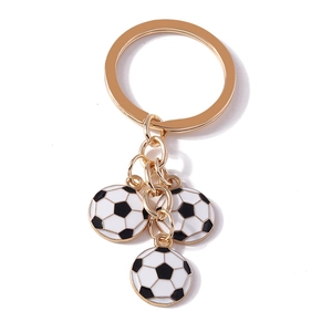 Golden football keychain with triple soccer ball pendants for sports bags and backpacks