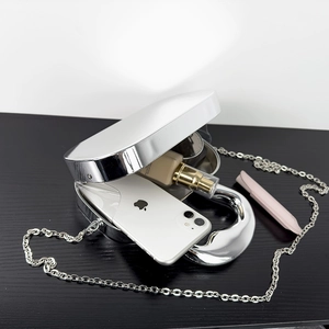 Silver metallic heart shaped box clutch bag with chain strap and luxury mirrored finish
