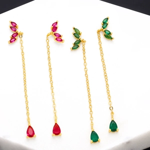 Elegant gold leaf tassel earrings with red and green zircon crystals in a luxury style