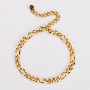 Detailed close-up of 5.5mm 3:1 twisted gold chain with lobster clasp and extension