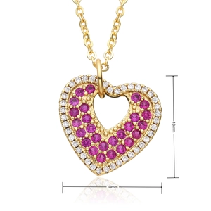 Detail view of a 18mm heart-shaped MOM necklace with red gemstones and white crystals