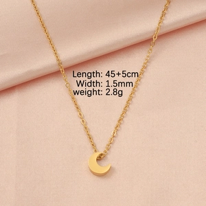 Detail shot of golden crescent moon necklace with 45+5cm chain length and 1.5mm width
