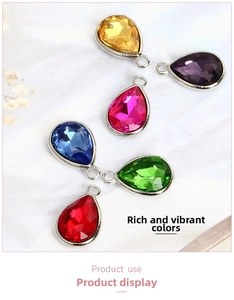 Macro shot of 7x10mm teardrop crystal pendants in six vibrant colors for DIY jewelry