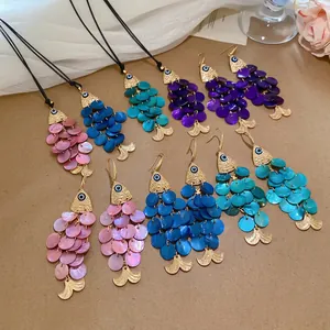 Tropical fish jewelry set with evil eye beads and colorful shell scales for beach vacation