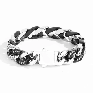 Detail of 12mm Cuban link bracelet with black and silver pavé diamond settings