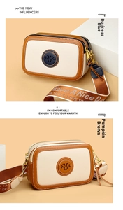 Detailed comparison of vintage crossbody camera bags in business blue and pumpkin brown