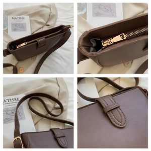 Detail view of dark brown vintage bucket bag showing smooth PU leather texture and zip