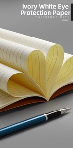 Macro view of ivory white eye-protection paper folded into heart shape for B5 notebook