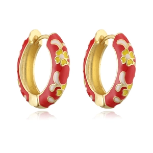 Detail of 18K gold plated hoop earrings with red enamel and floral petal patterns
