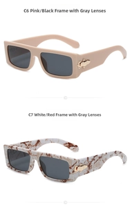 Detail view of pink and white marble rectangle sunglasses with gold metal hinges