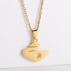 Minimalist swan pendant necklace in 18k gold plating with hollow floral patterns