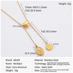 Detail of golden Y-shaped stainless steel necklace with heart and coin pendants