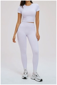 Detailed view of lavender high-waisted yoga leggings and crop top athletic set for women