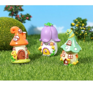 Close-up of colorful resin mushroom house miniatures for garden and desk decor