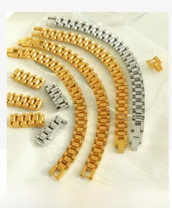 Detailed view of gold and silver watch-style link bracelets and accessories