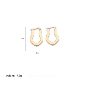 Detail view of gold irregular U-shaped stainless steel earrings with 3cm x 2cm dimensions