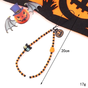 Halloween beaded phone strap with orange and black beads featuring cat and pumpkin charms