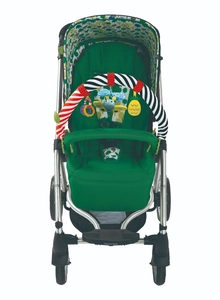 Green baby stroller featuring colorful patterned canopy and attached bird animal toy bar