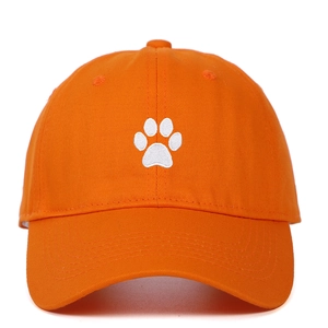 Orange cotton baseball cap with white paw embroidery featuring a pre-curved brim design