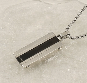 Close-up of hip-hop square pendant with black inlay and S.Steel engraving details